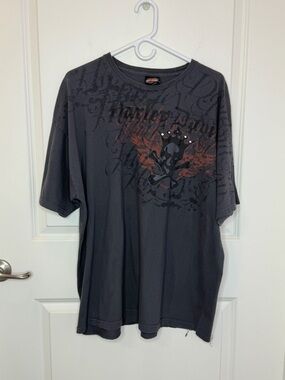 Vintage Harley-Davidson graphic t-shirt w/ distressed skull and wings design 2XL